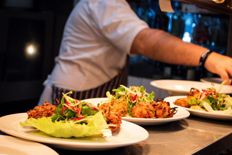 Head chef quality controlling food